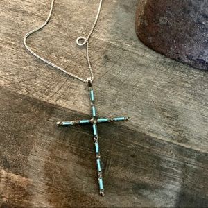 Turquoise cross necklace. Sterling silver with a 16” chain.